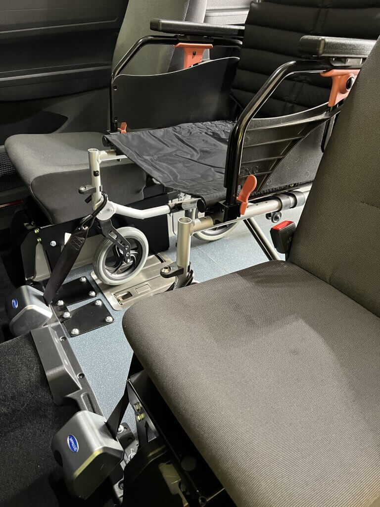 Ford Tourneo Connect Grand XL with 2 slim seats showing the position of the wheelchair in-between the 2 seats